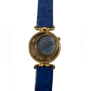 Vienna Elegant Gold and Blue Watch 
(NEED BATTERY)
Lose Diamond in the face